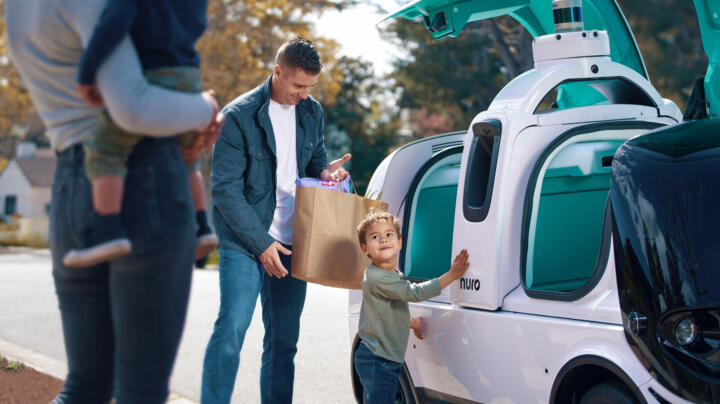 Smart, self-driving high-tech robots delivering supermarket or fast-food orders ...